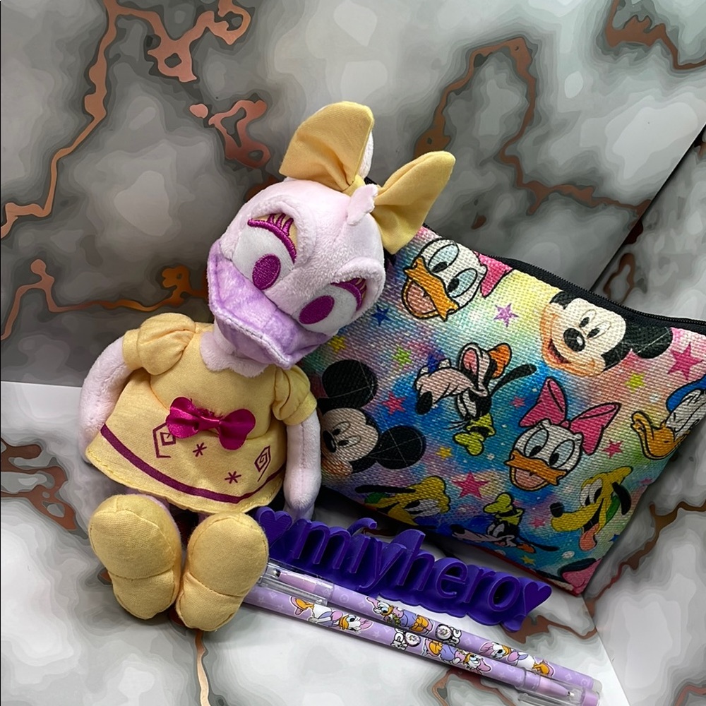 4pc Disney set with Mad Tea Party DAISY Plush toy, pencil case & 2 erasable pens